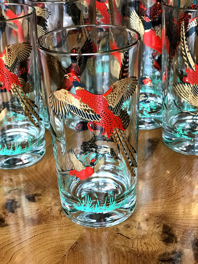 Water glasses printed with red and gold pheasants, and green trim